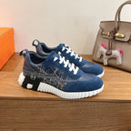 Unisex navy sneakers with white laces, patterned side stripe and chunky sole