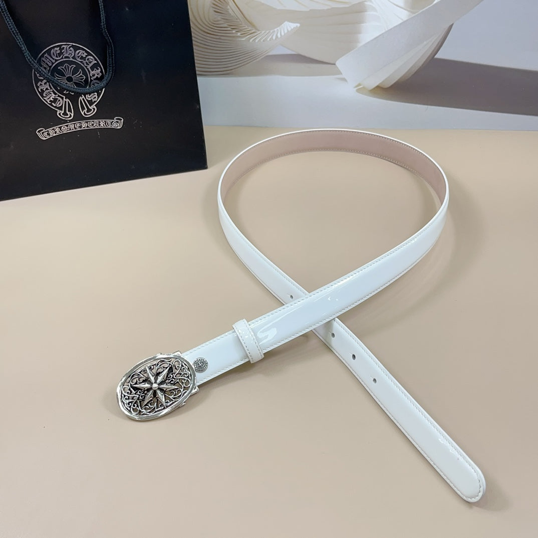 White leather belt with ornate silver oval buckle and adjustable band