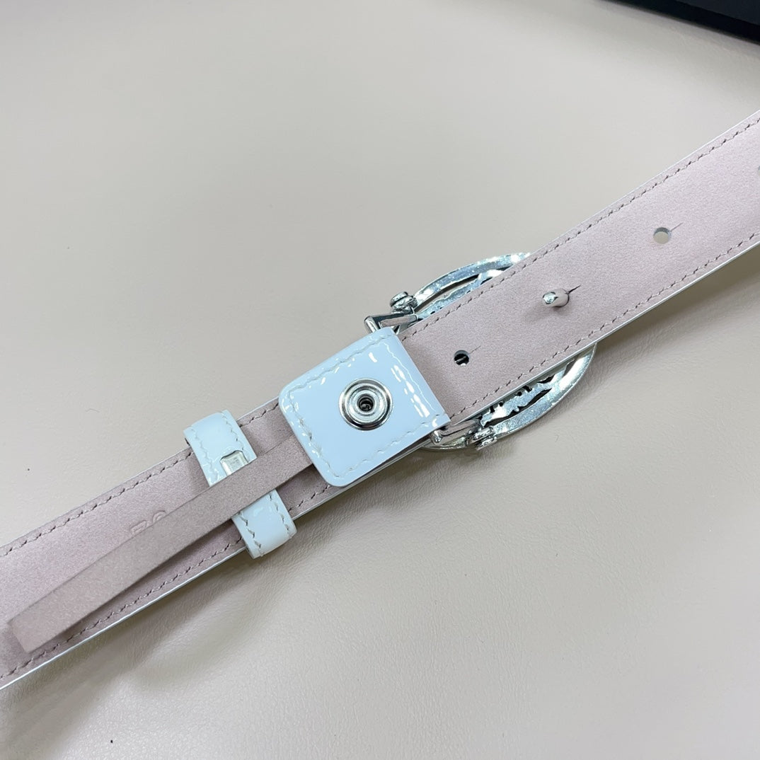 White leather belt with silver prong, light blue keeper strap, and punched holes