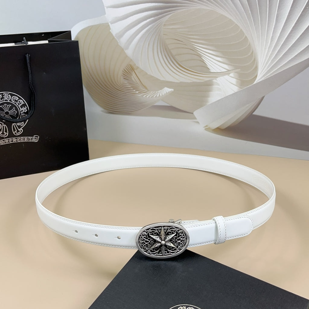 White leather belt with round ornate silver buckle and belt holes