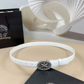 White leather belt with round ornate silver buckle and belt holes