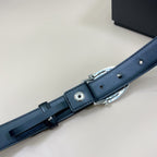 Navy belt close-up showing adjustment holes and metal clasp hardware