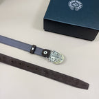 Dusty blue leather belt with oval ornate silver buckle and adjustable holes