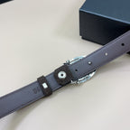 Dusty blue belt with oval silver buckle, metal eyelet and adjustable strap