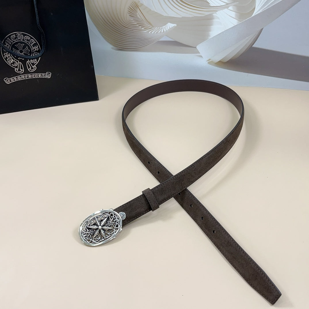 Dark brown suede belt with oval ornate silver buckle, laid flat with strap ends
