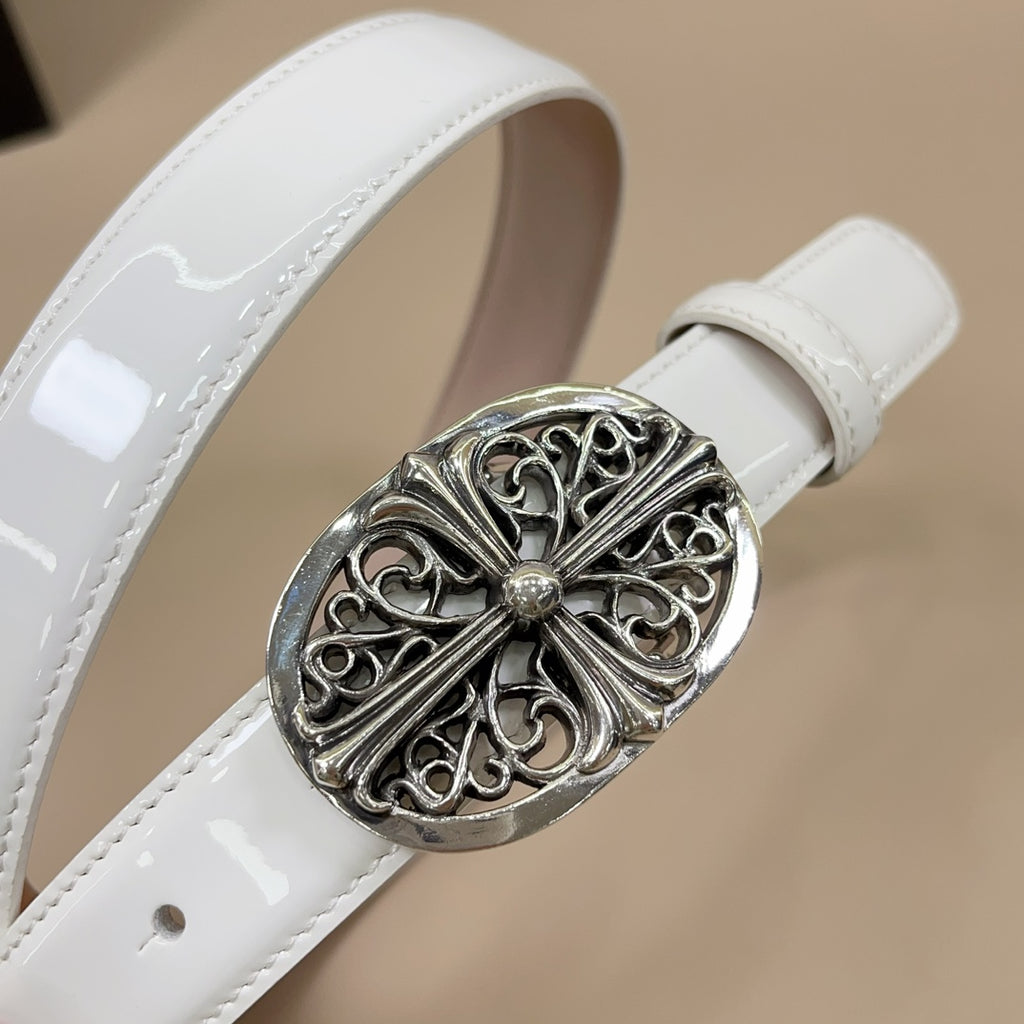Glossy white belt with detailed chrome oval buckle, filigree pattern and center gem