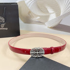 Red leather belt with oval silver filigree buckle and adjustable holes