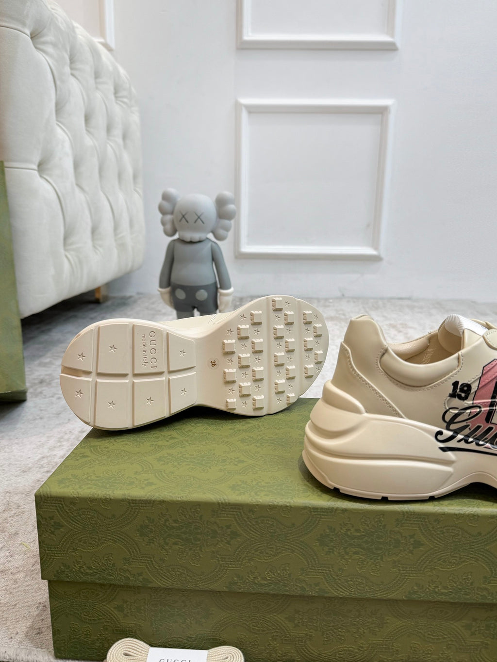 Light beige sneaker outsole with studded traction and heel edge