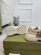 Light beige sneaker outsole with studded traction and heel edge