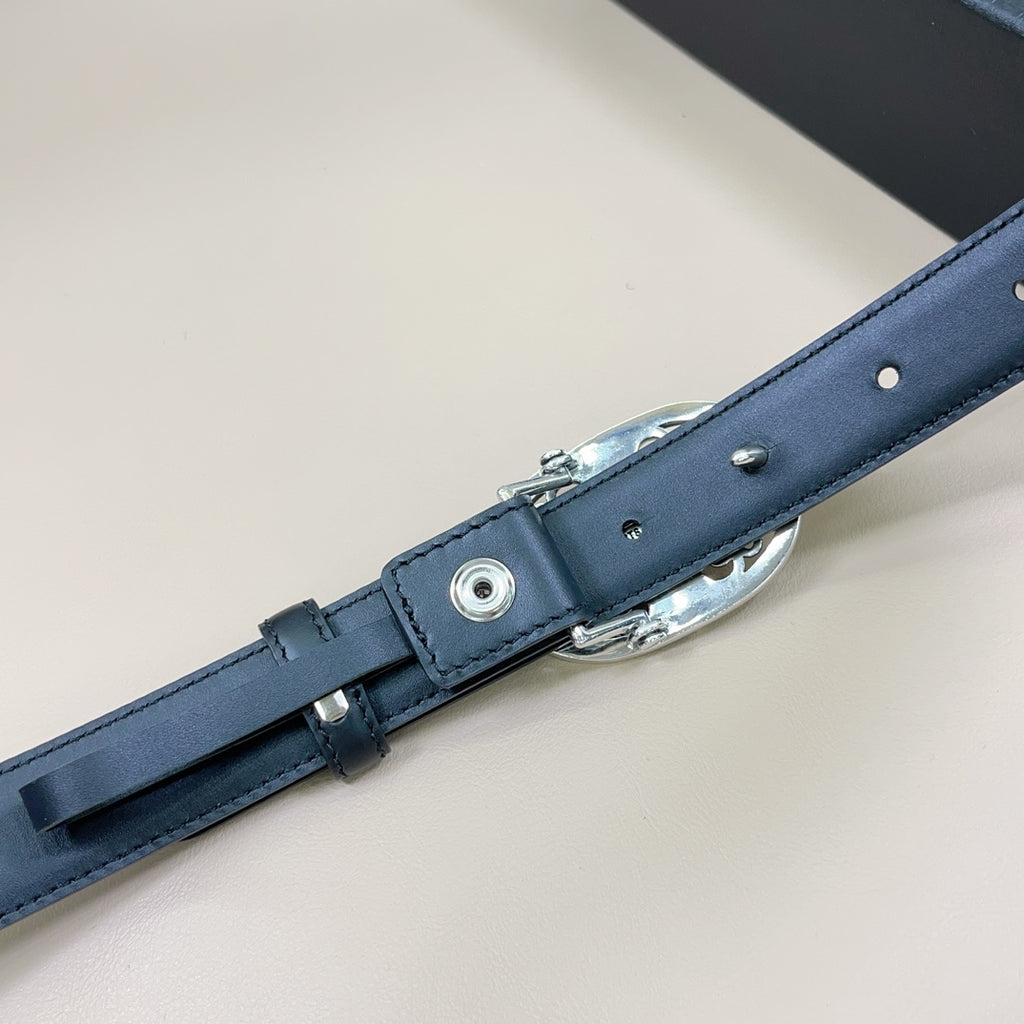 Navy leather belt with adjustable buckle hardware, visible eyelet and metal prong