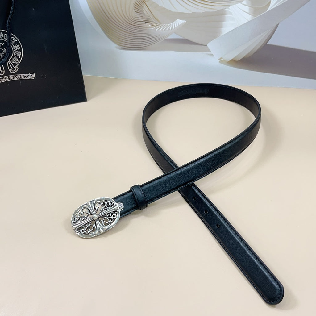Chrome belt styled in an X shape: dark blue leather with oval silver filigree buckle