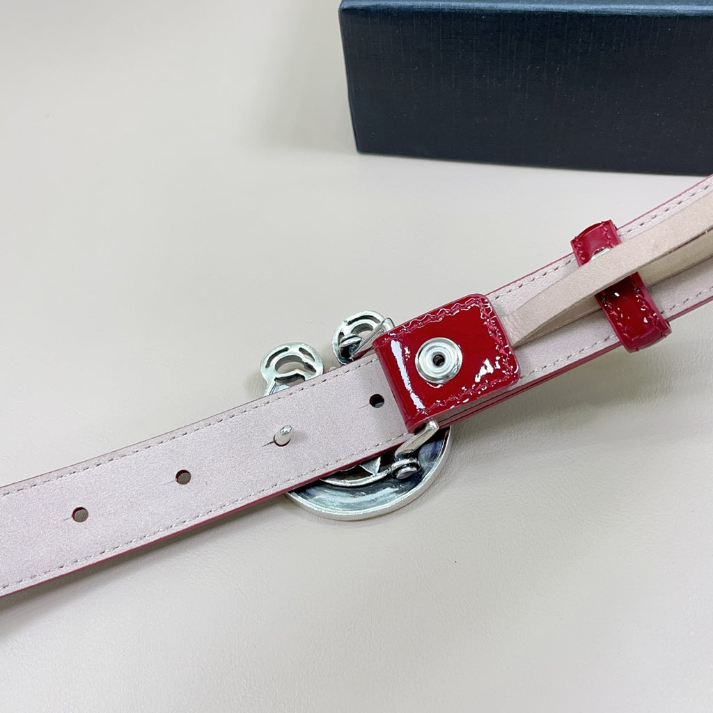 Chrome belt reverse side: light lining, red end tab, metal buckle hardware