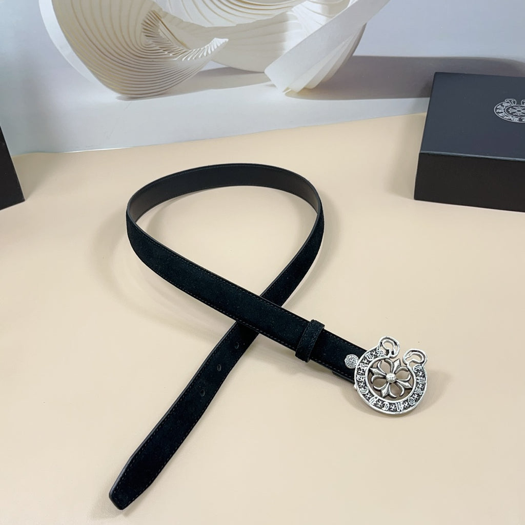 Chrome belt with dark strap and silver circular floral buckle with adjustable holes