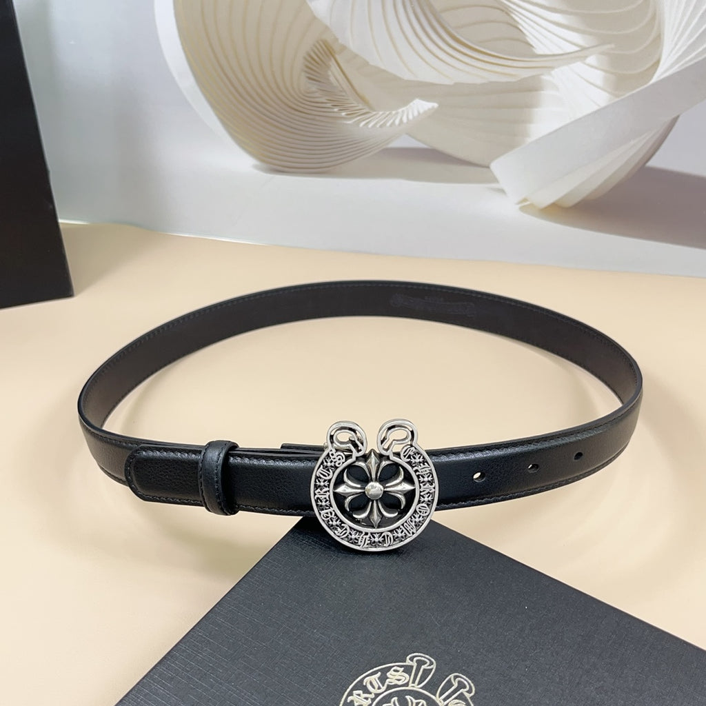 Black leather belt with silver-tone floral heart buckle and eyelet holes