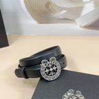 Dark leather belt with silver-tone ornate heart buckle and floral center