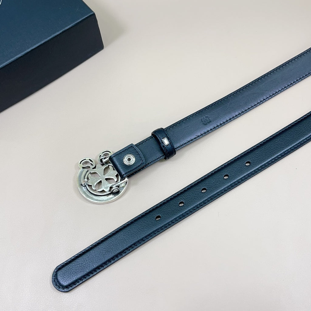 Dark blue leather belt with silver-tone heart buckle plate and multiple eyelets