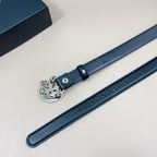 Dark blue leather belt with silver-tone heart buckle plate and multiple eyelets