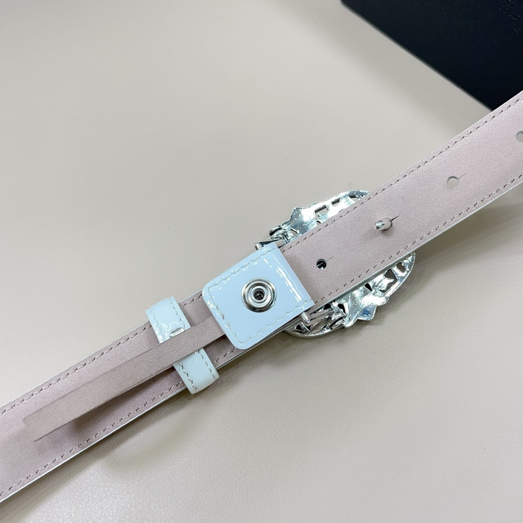 Belt clasp and strap keeper in silver-tone hardware on light blue leather belt