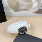 White leather belt with large ornate silver-tone buckle, side view