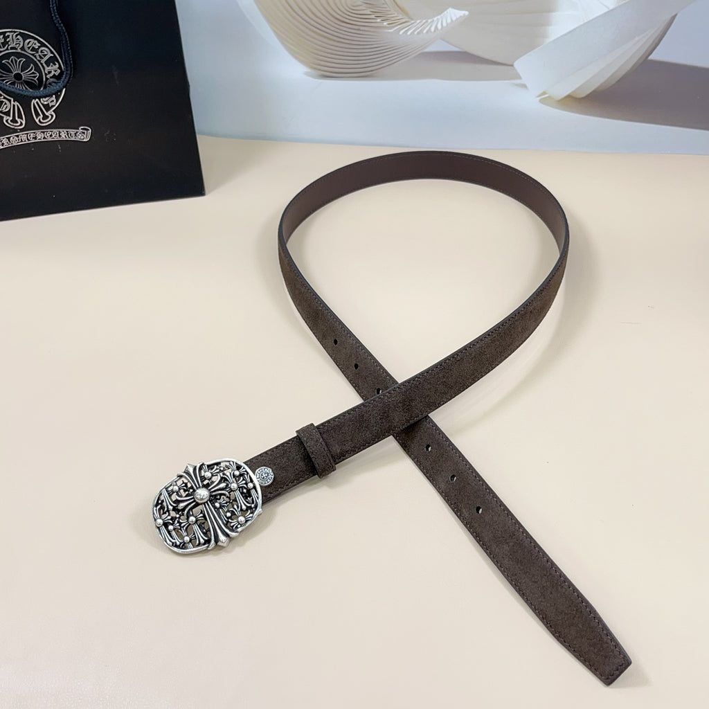 Chrome belt laid flat: dark brown belt with round chrome-toned floral buckle
