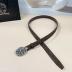 Chrome belt laid flat: dark brown belt with round chrome-toned floral buckle