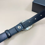 Dark blue leather belt end with metal pin buckle hardware and strap loops
