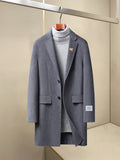 Long coat with notch lapels, single-button front, chest and hip pockets, dark blue-gray