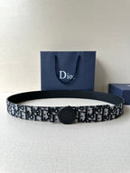 Logo-print belt with dark round buckle, black-and-white patterned strap