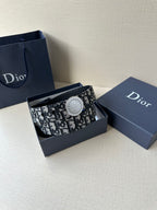 Logo-print belt with round light buckle, black-and-white monogram patterned strap