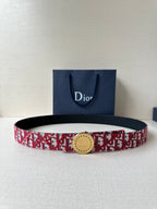 Dior belt with red and white monogram strap and black leather edge, round gold buckle