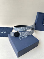 Dior belt on blue gift box with monogram strap and round black buckle