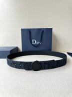 Navy Dior belt with round logo buckle and monogram-pattern strap