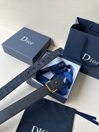 Navy Dior belt with gold-tone buckle and monogram strap in a box set