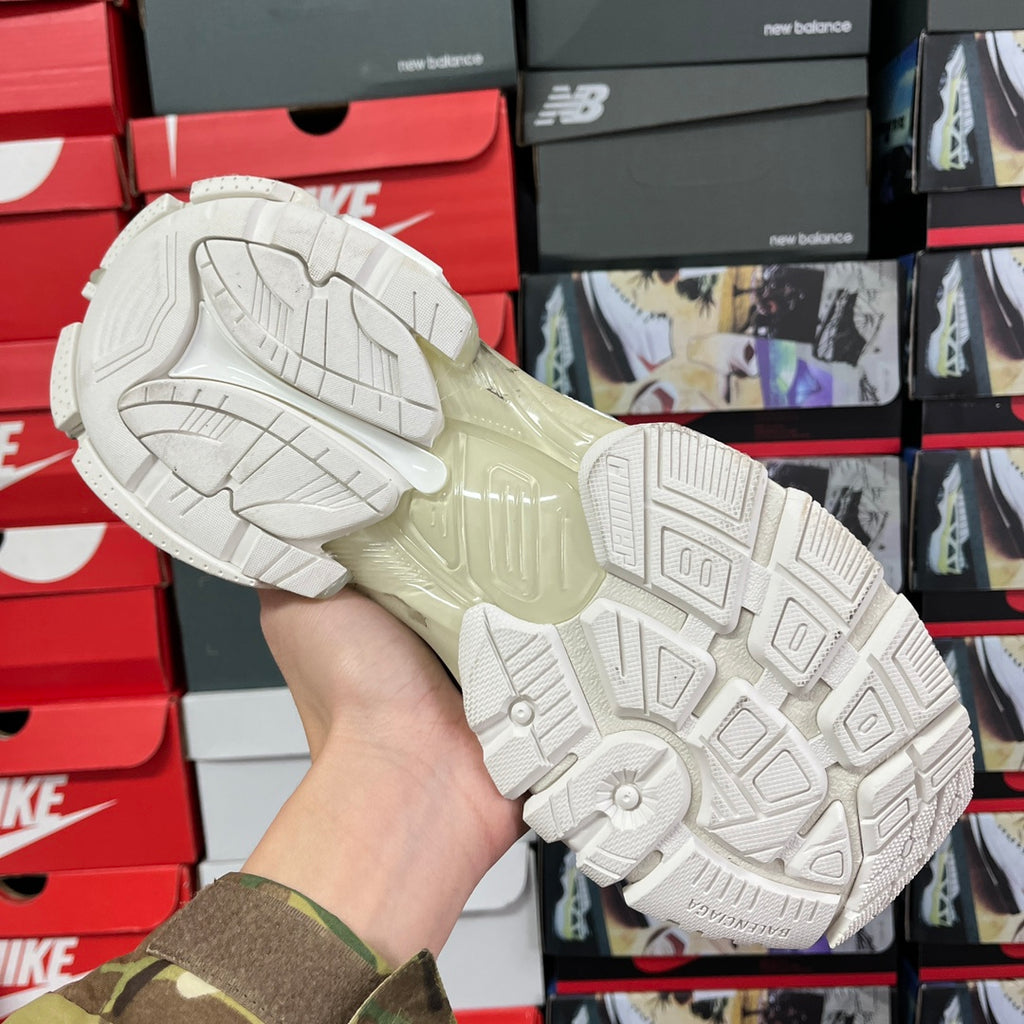 White sneaker outsole with tread pattern and thick midsole