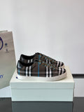 Burberry plaid low-top sneakers, black trim, lace-up with blue accents