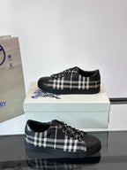 Burberry black lace-up sneakers with check pattern and fringe trim
