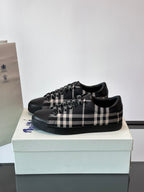 Burberry sneakers on box, black with black-and-white check strap and fringe