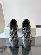 Burberry sneakers side view, black leather with black-and-white check lacing