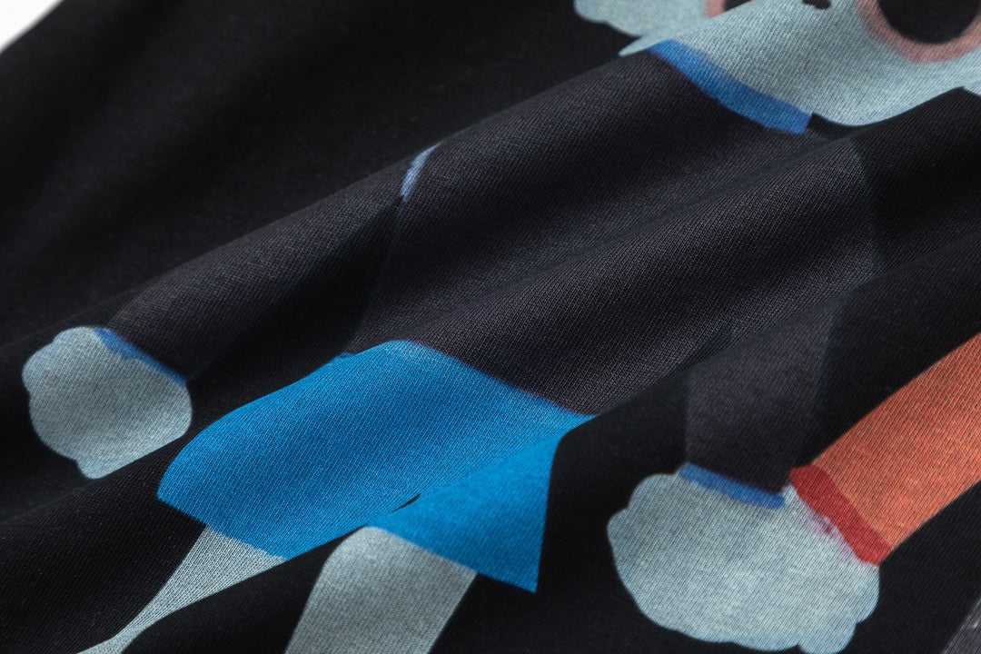 Black Gucci T-shirt graphic detail showing blue and orange character figures