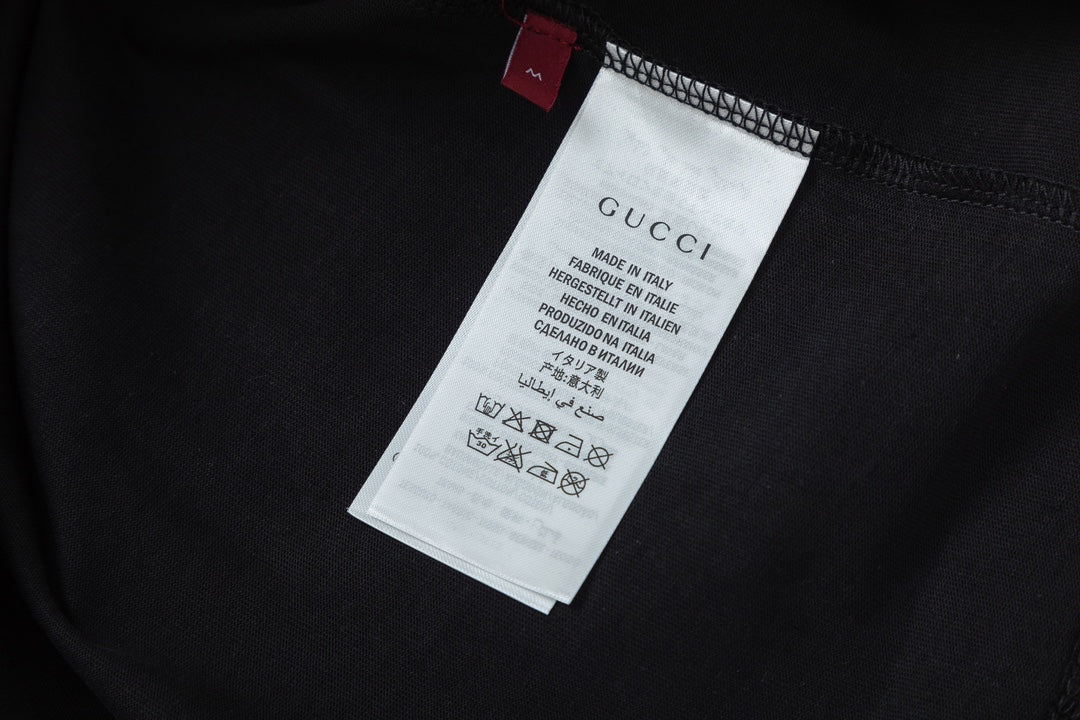 Gucci shorts care label tag attached near waistband