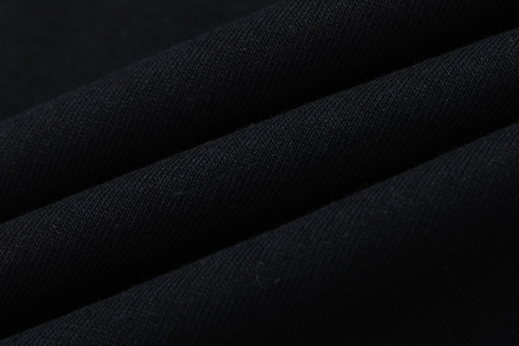 Gucci shorts fabric close-up in dark black knit
