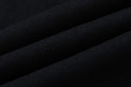 Gucci shorts fabric close-up in dark black knit