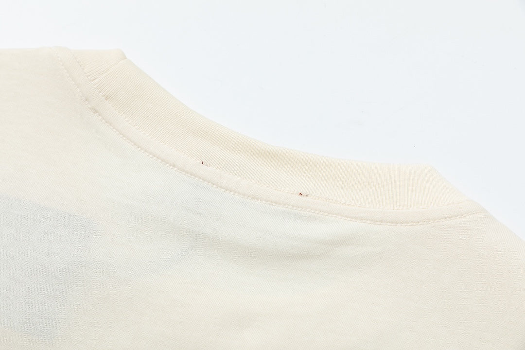 Cream T-shirt neckline seam and ribbed crew collar