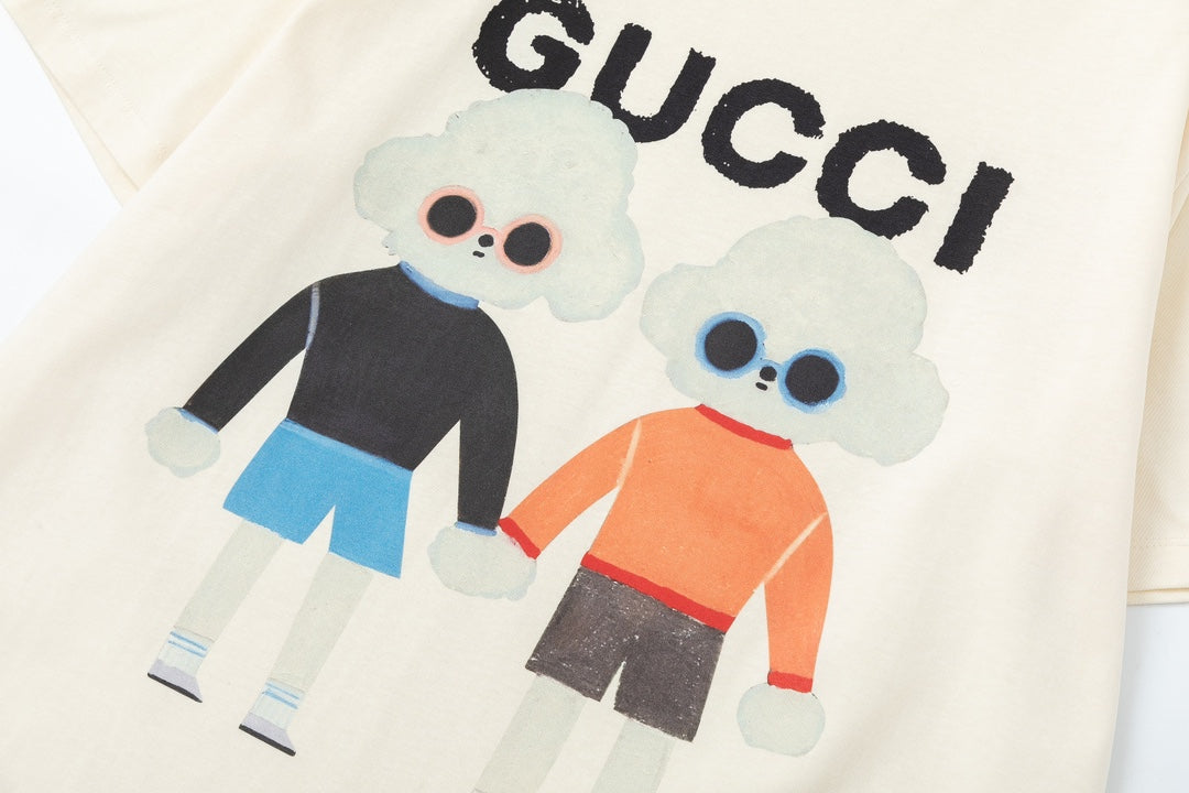 Cream Gucci T-shirt close-up of bear couple graphic and Gucci text