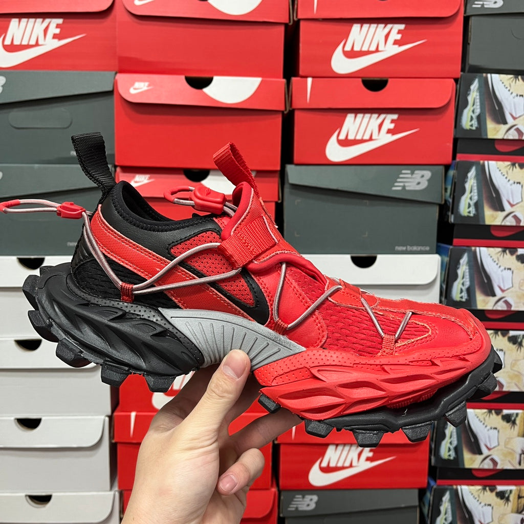Red and black chunky sneaker, front three-quarter view with laces