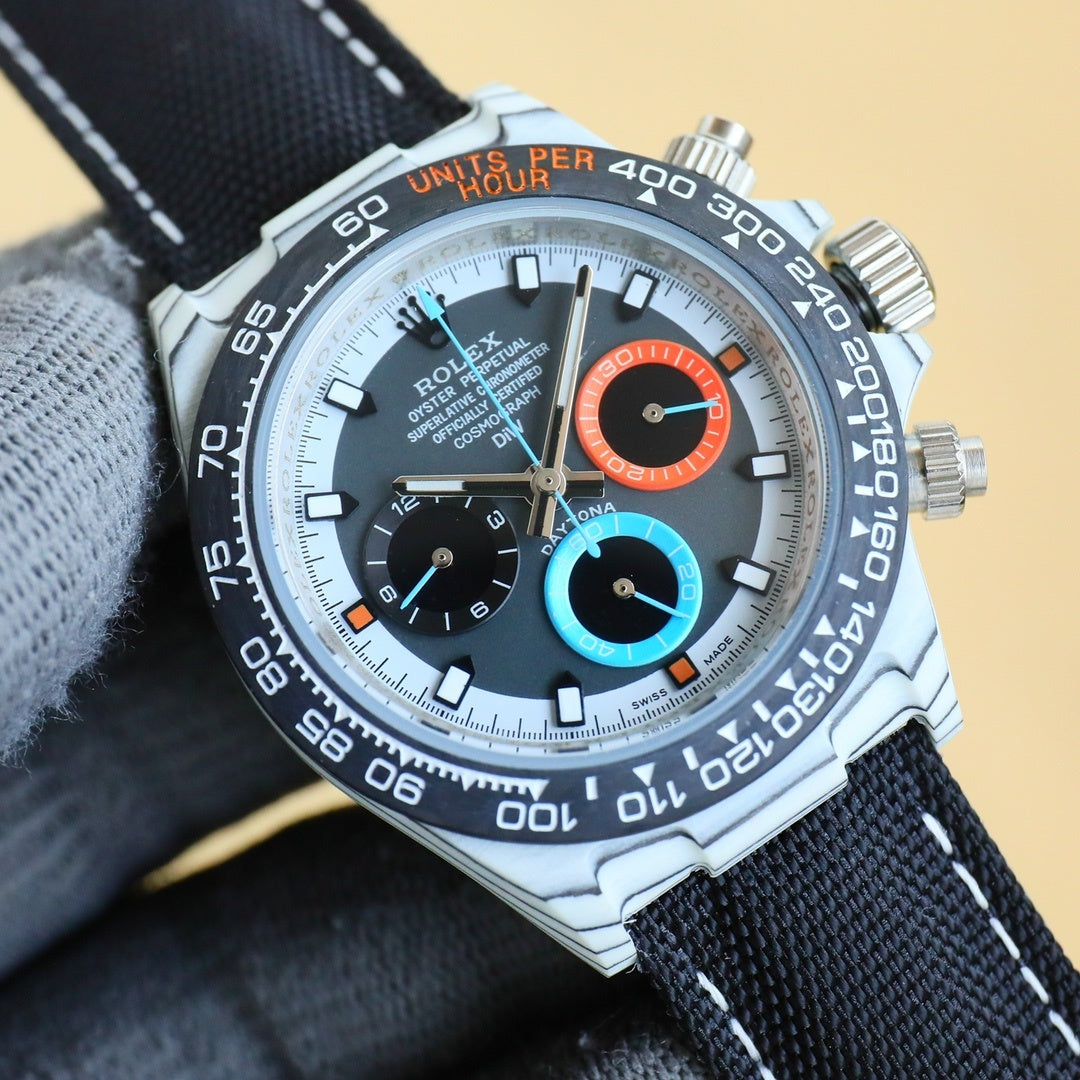 Rolex Daytona watch with white dial, black bezel, and orange and blue subdials.