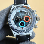 Rolex chronograph watch with white dial, orange and blue accents, stainless case, black strap