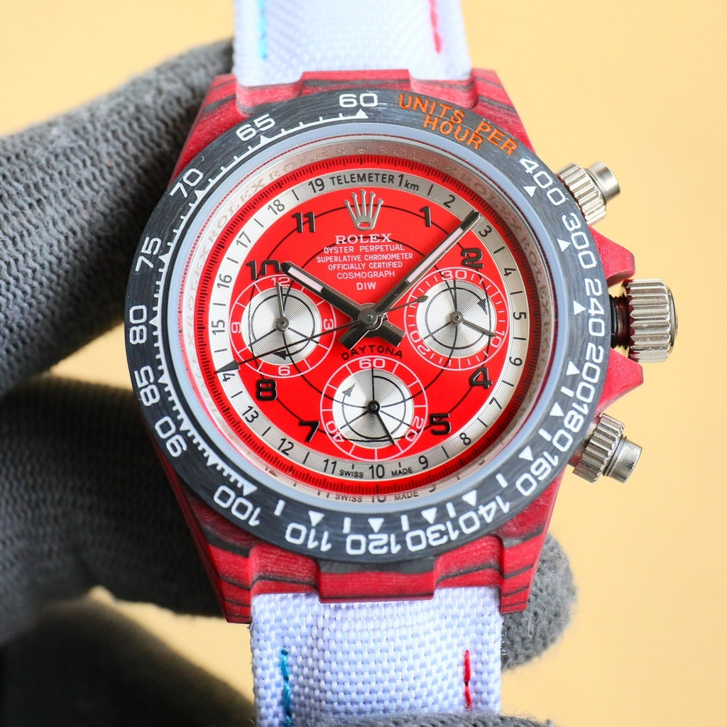 Rolex chronograph watch with red dial, red bezel, stainless case, red fabric strap
