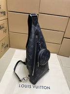 Dark monogram sling bag with zip-front and attached round mini pouch
