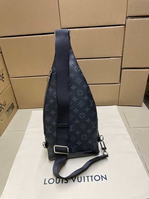Dark monogram sling bag with adjustable strap and metal buckle